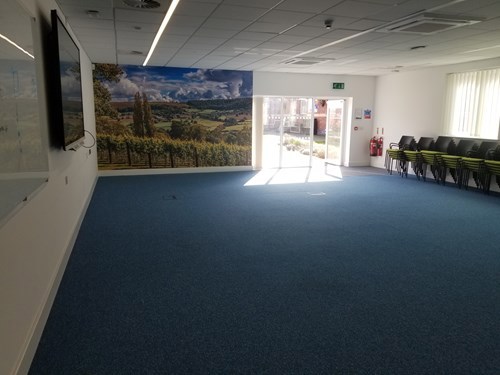 Meeting room with no furniture in view