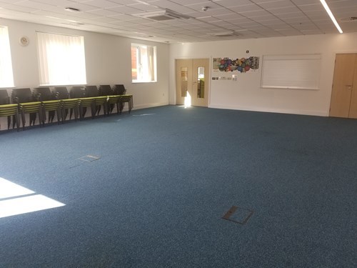 Meeting room with blue carpet